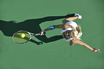 Image showing young woman play tennis outdoor