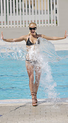 Image showing beautiful woman relax on swimming pool