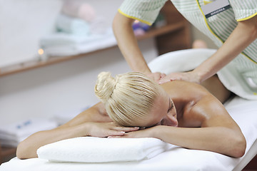 Image showing woman at spa and wellness back massage