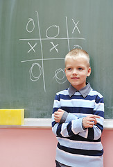 Image showing happy young boy at first grade math classes 