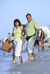 Image showing happy seniors couple  on beach