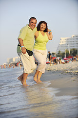 Image showing happy seniors couple  on beach