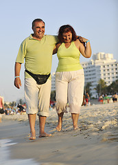 Image showing happy seniors couple  on beach