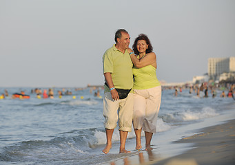 Image showing happy seniors couple  on beach