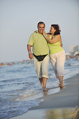 Image showing happy seniors couple  on beach