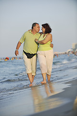 Image showing happy seniors couple  on beach