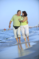 Image showing happy seniors couple  on beach