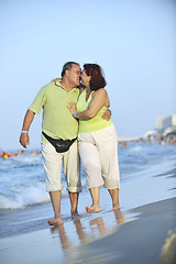 Image showing happy seniors couple  on beach