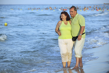 Image showing happy seniors couple  on beach