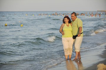 Image showing happy seniors couple  on beach