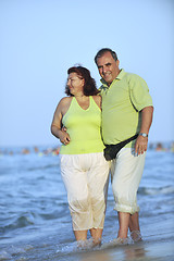 Image showing happy seniors couple  on beach