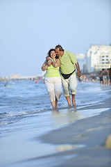 Image showing happy seniors couple  on beach