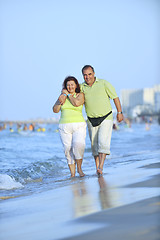 Image showing happy seniors couple  on beach