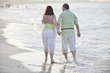 Image showing happy seniors couple  on beach