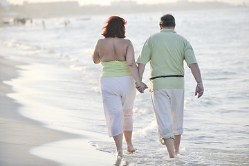 Image showing happy seniors couple  on beach