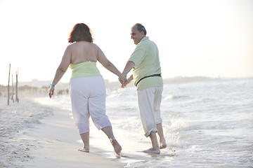 Image showing happy seniors couple  on beach