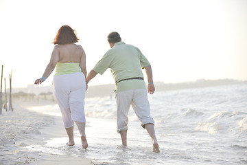 Image showing happy seniors couple  on beach