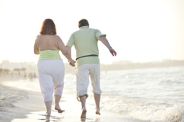 Image showing happy seniors couple  on beach