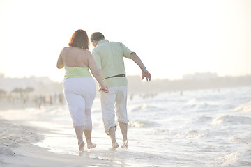 Image showing happy seniors couple  on beach