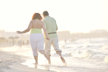 Image showing happy seniors couple  on beach