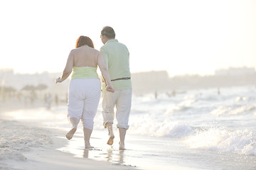 Image showing happy seniors couple  on beach