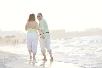 Image showing happy seniors couple  on beach