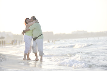 Image showing happy seniors couple  on beach