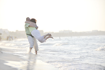 Image showing happy seniors couple  on beach