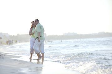 Image showing happy seniors couple  on beach