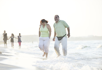 Image showing happy seniors couple  on beach