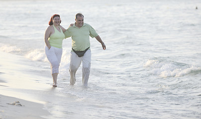 Image showing happy seniors couple  on beach