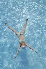 Image showing woman relax at swimming pool 