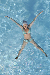 Image showing woman relax at swimming pool 