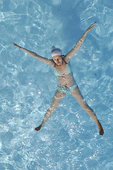 Image showing woman relax at swimming pool 