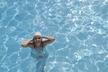 Image showing woman relax at swimming pool 