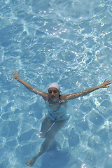 Image showing woman relax at swimming pool 