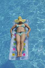 Image showing woman relax at swimming pool 