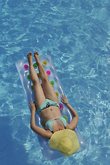 Image showing woman relax at swimming pool 