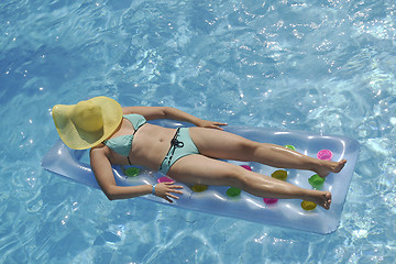 Image showing woman relax at swimming pool 