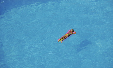 Image showing woman relax at swimming pool 