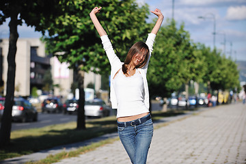 Image showing young woman havefun at street 