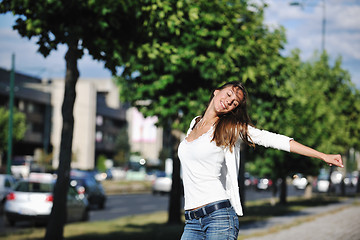 Image showing young woman havefun at street 