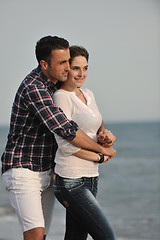 Image showing happy young couple have fun on beach