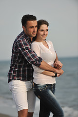 Image showing happy young couple have fun on beach