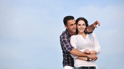 Image showing happy young couple have fun on beach