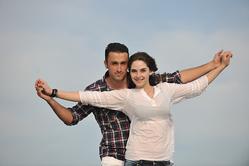 Image showing happy young couple have fun on beach