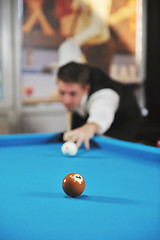 Image showing young man play pro billiard game 