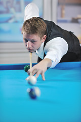 Image showing young man play pro billiard game 