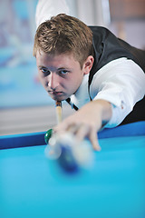 Image showing young man play pro billiard game 