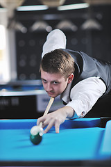 Image showing young man play pro billiard game 